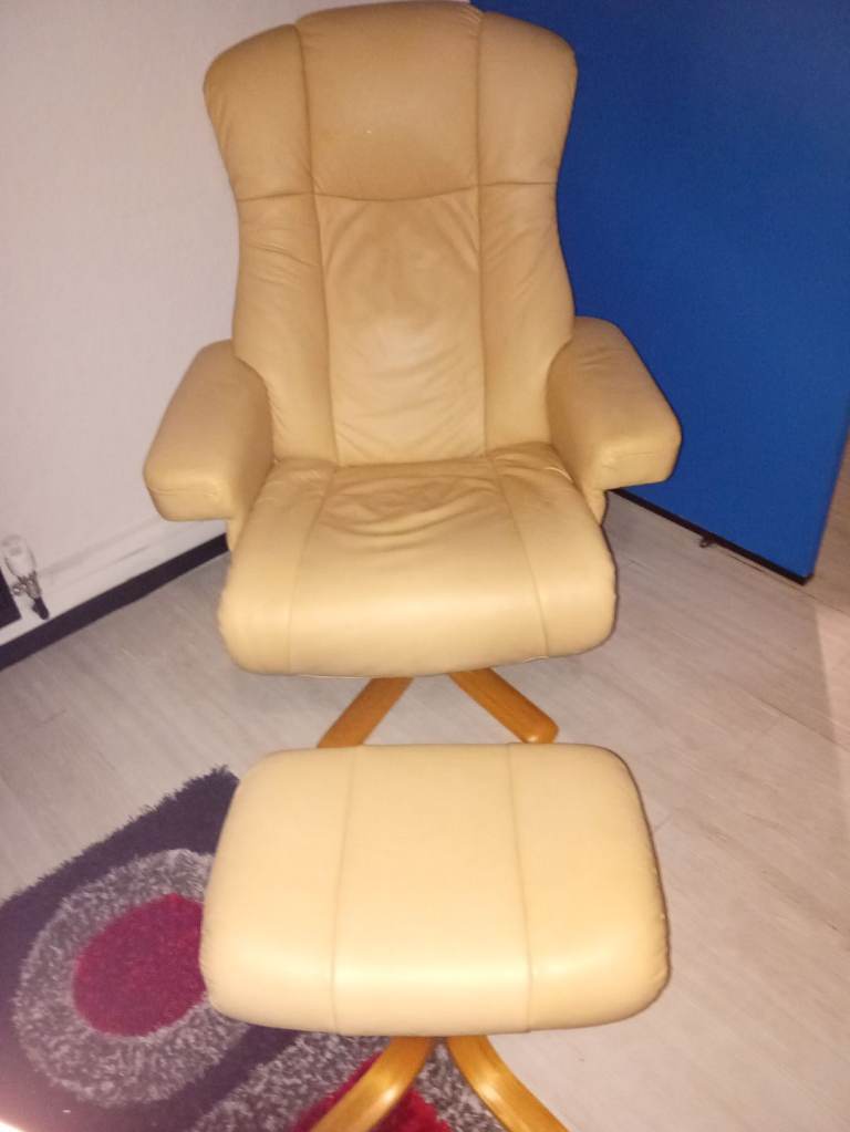 Swivel leather chair and foot rest 