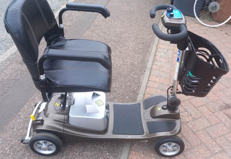 Li Tech superlite aluminium boot scoot mobility scooter.  Excellent. 