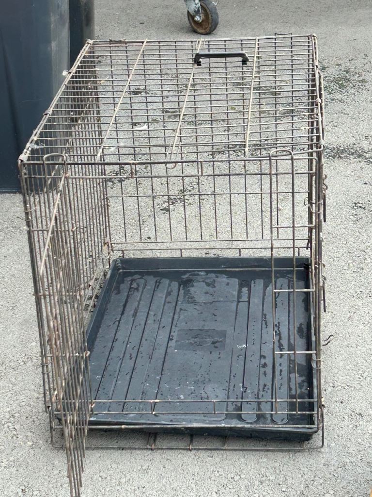 Dog crate with waterproof cover