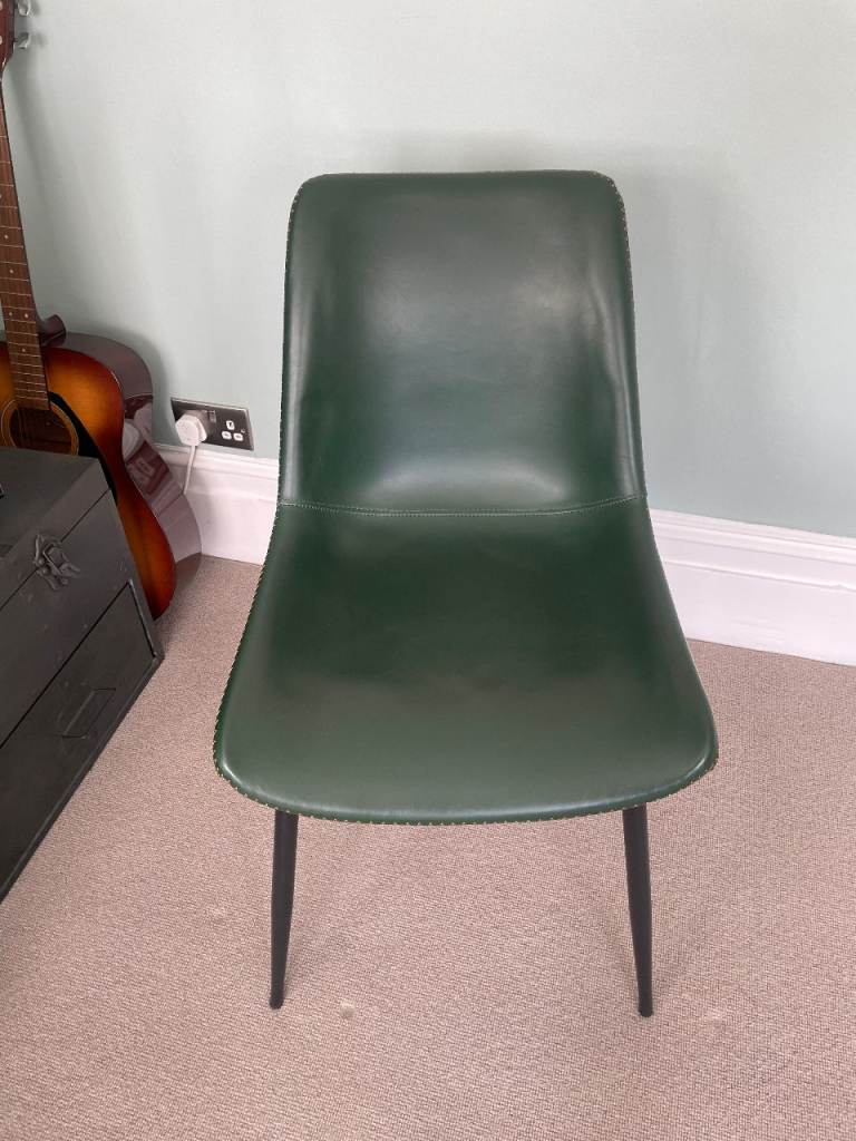 Two Graham and Green dark green leather chairs with orange trim. Original price £160 each 