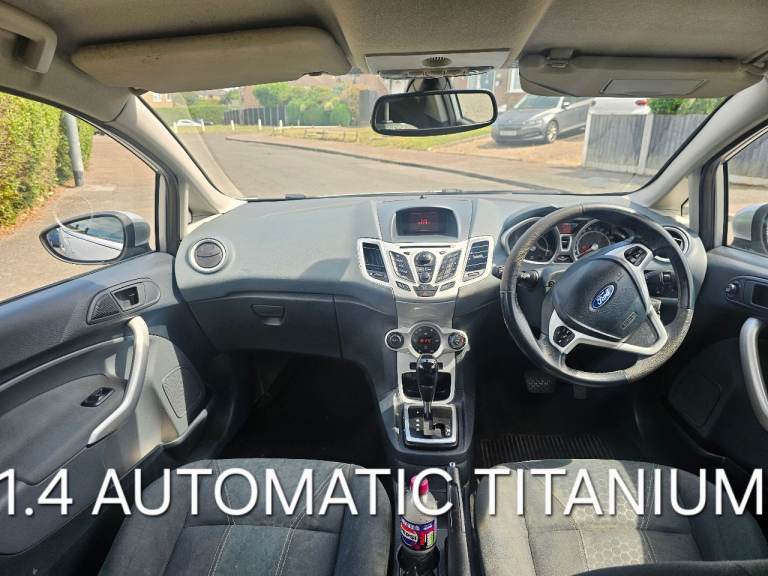 fiesta 1.4 AUTOMATIC TITANIUM 1YR MOT F.S.H NEW CAMBELT IMMACULATE IN AN OUT DRIVES PERFECT 