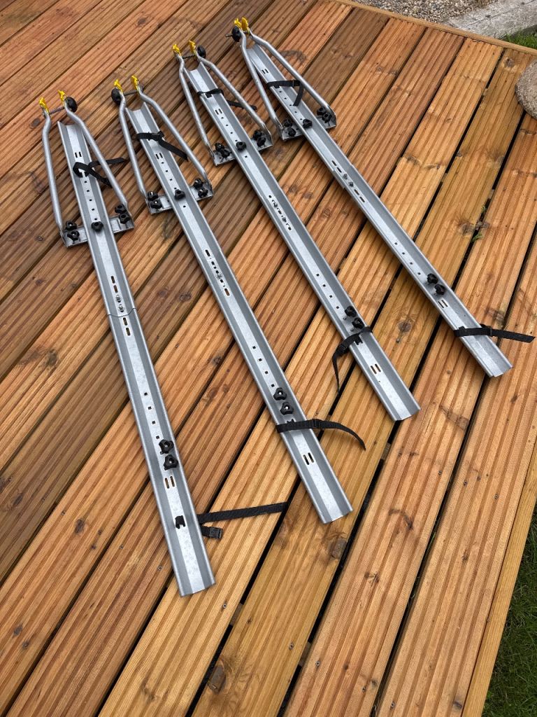 Set of 4 Silver Bike Roof Rack Carriers – Good Condition