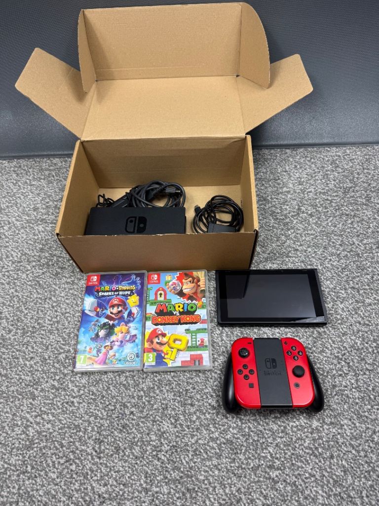 Nintendo Switch Console with Dock, Joy-Cons, and 2 Mario Games