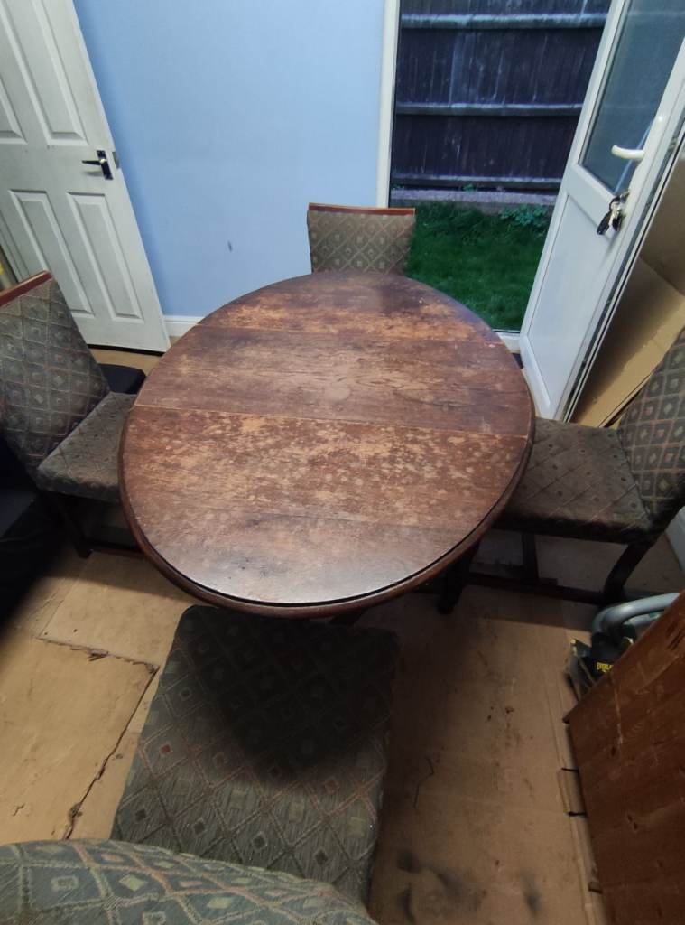 Folding Dining table and 4 chairs (Free delivery)