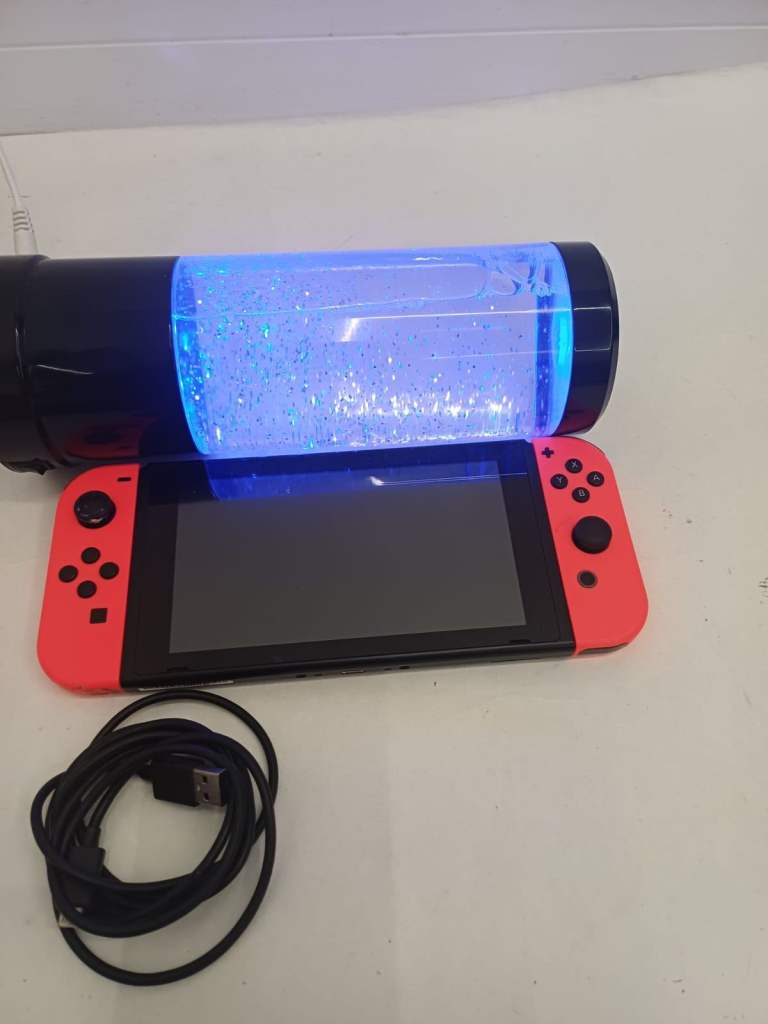Nintendo switch with charger cable 