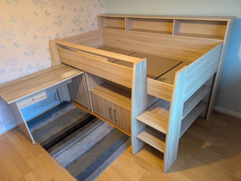 Wooden mid sleeper bed with retractable desk and storage