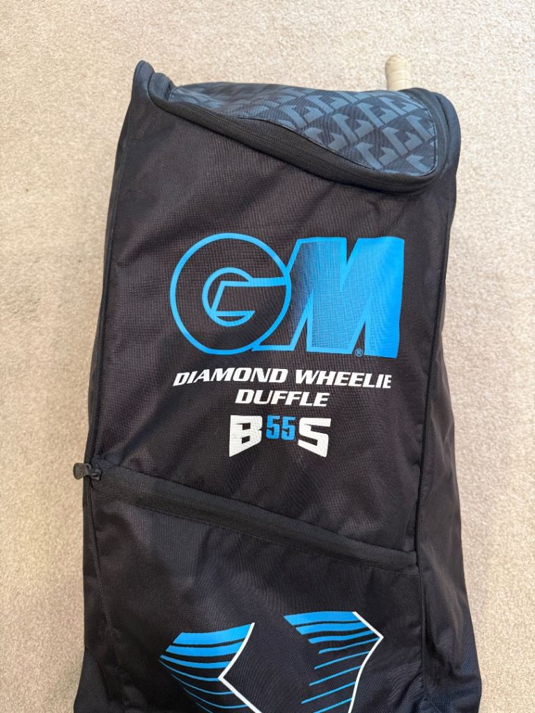 Youth Cricket bag with helmet, bat, pads and gloves