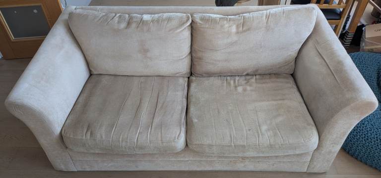 Cream Two-Seater Sofa – Fair Condition