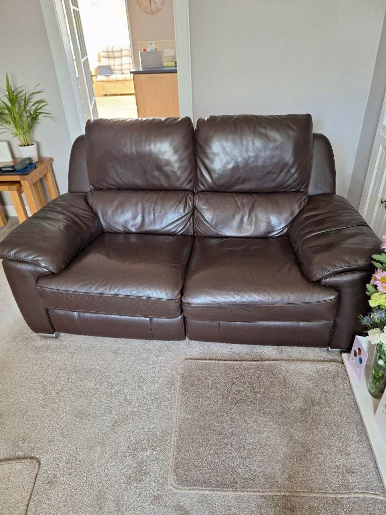 2 X 2 Seater sofas & armchair Brown Leather electric recliners £100 ono