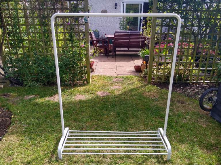 White Metal Clothes Rail with Shoe Rack and double zipped plastic cover– Good Condition