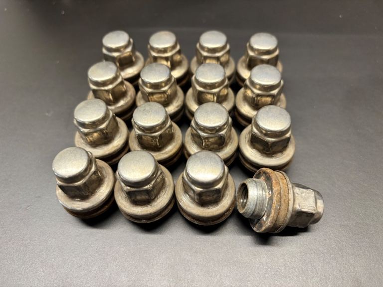 16 used Jaguar original wheel nuts