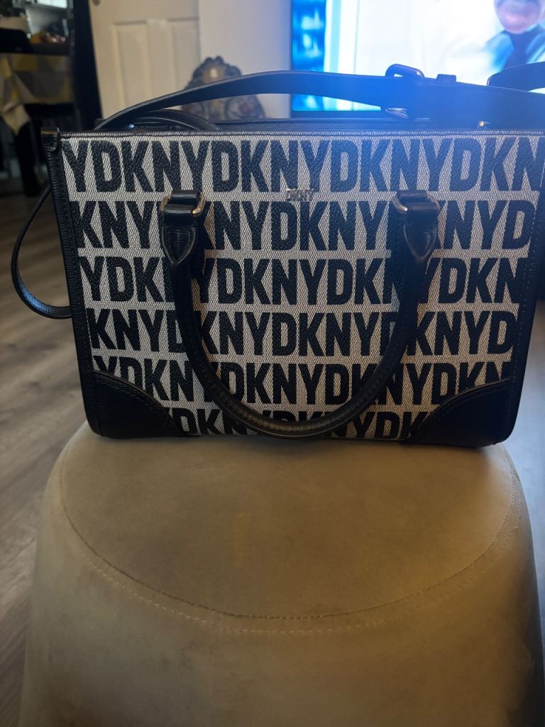 Black DKNY shoulder/ clutch bag. Used once