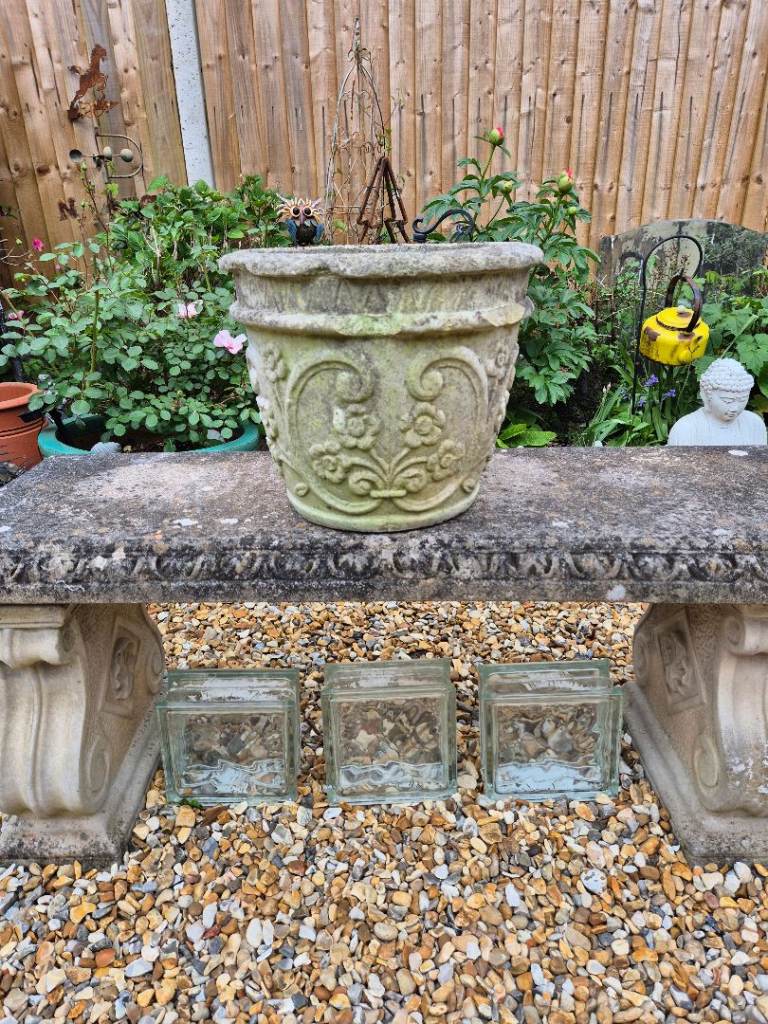 An Old Weathered Concrete Planter