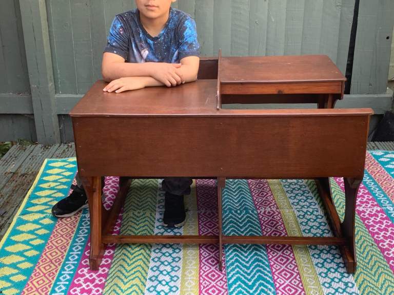 Hand made custom two-seater and two-desk seat for children 
