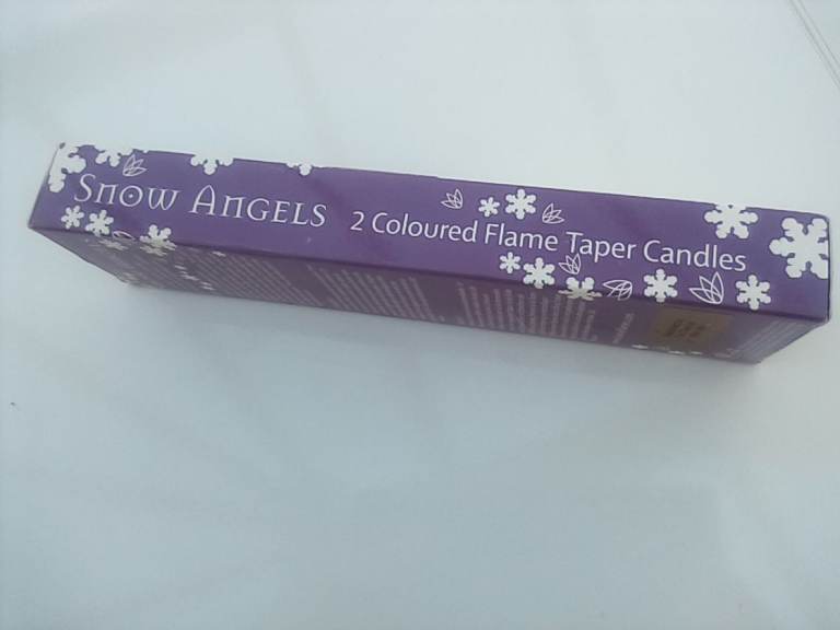 Brand new pack of two Snow Angels flame taper candles.