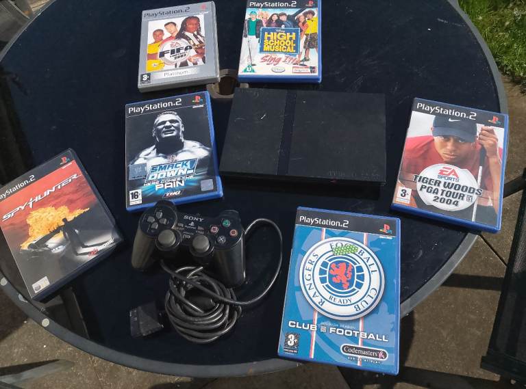 Sony PlayStation 2 Console with Controller and Games