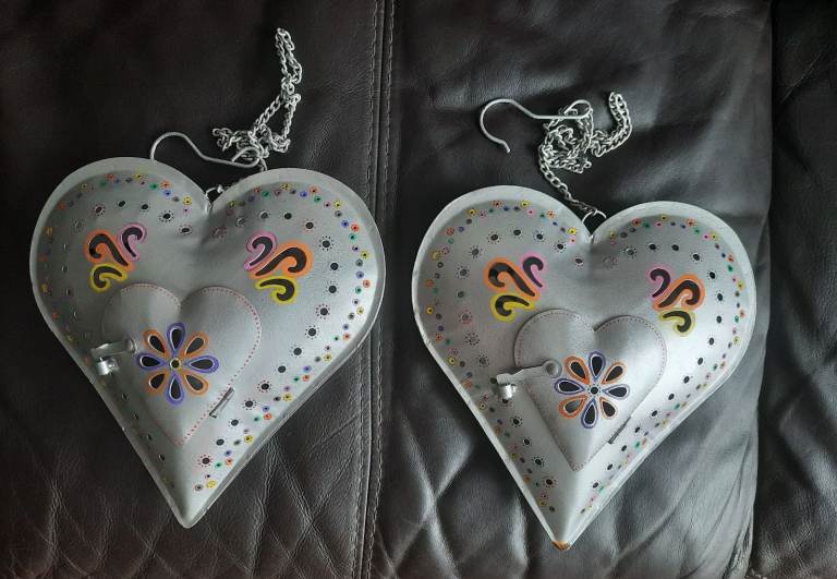 Unique hand decorated metal heart hanging tea light holders 