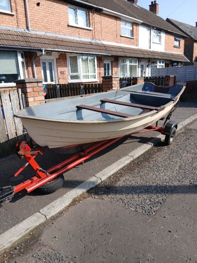 15ft boat and trailer with outboard