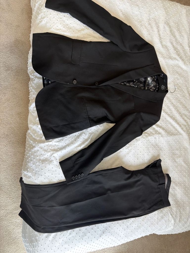Black Next man’s suit