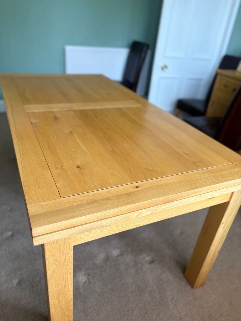Solid oak extending dining table