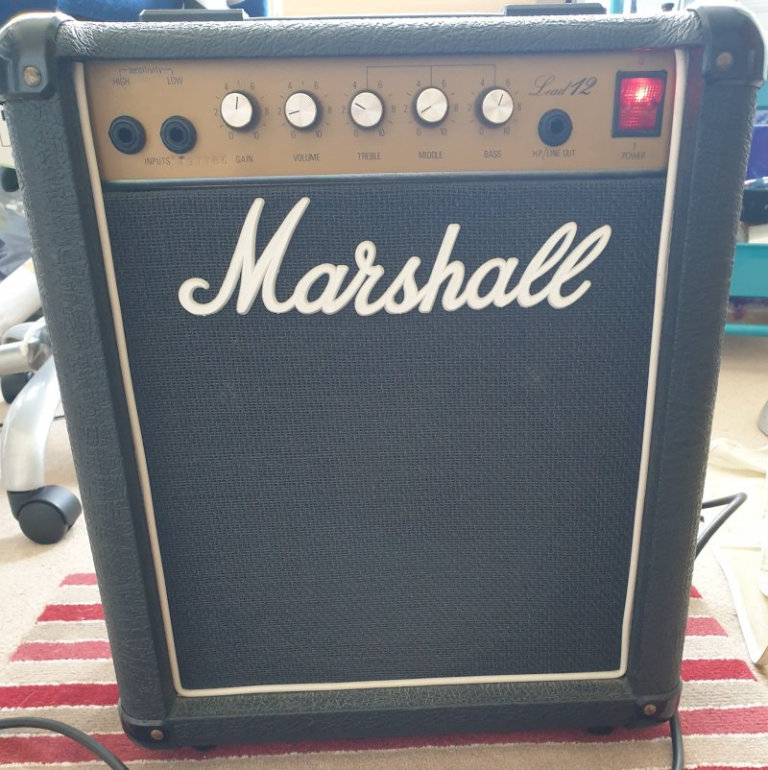 Fender Squire Stratocaster Guitar, with Marshall Amplifier and Danelectro Cool Cat Chorus effect.