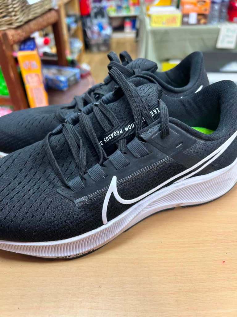 Black and White Nike Pegasus size UK 5.5.