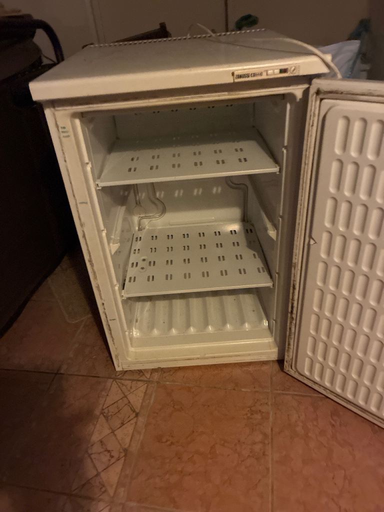 1 at 20 year old Zanussi Freezer and 1 table top freezer 