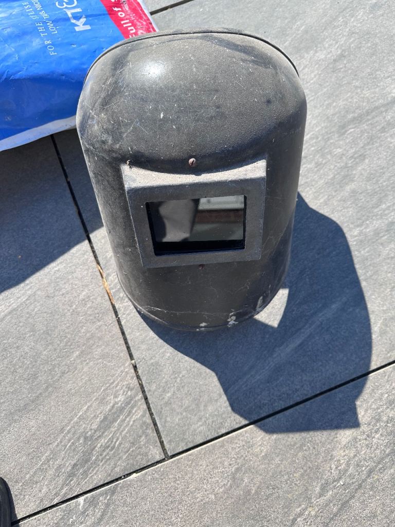 Welding helmet / mask plus whole bag of assorted welding  rods