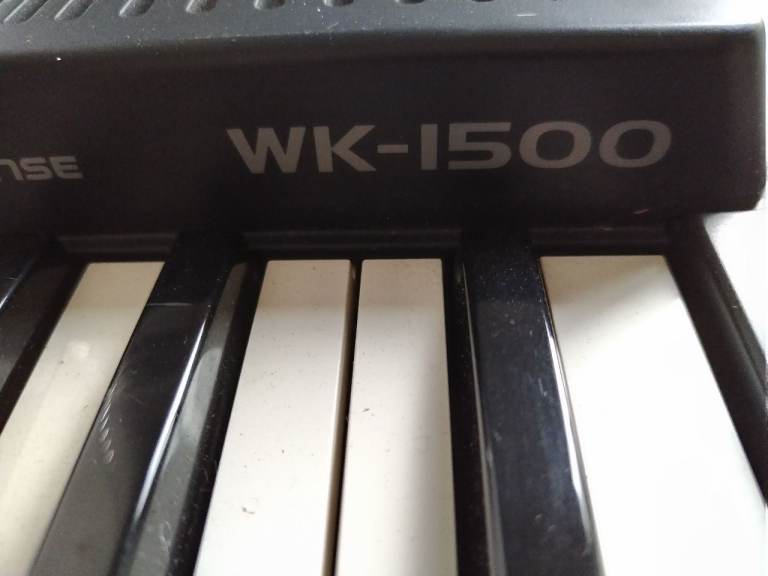Electric keyboard Casio with power lead and stand in very good condition good working order 