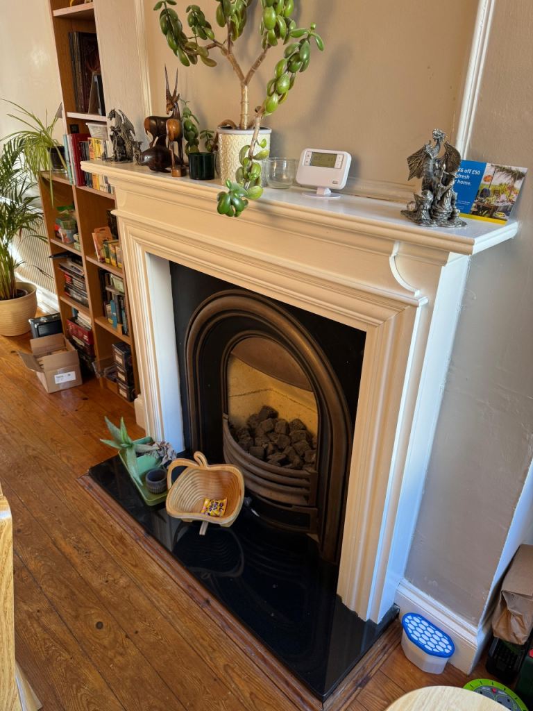 Cast Iron fireplace insert, hearth and mantel