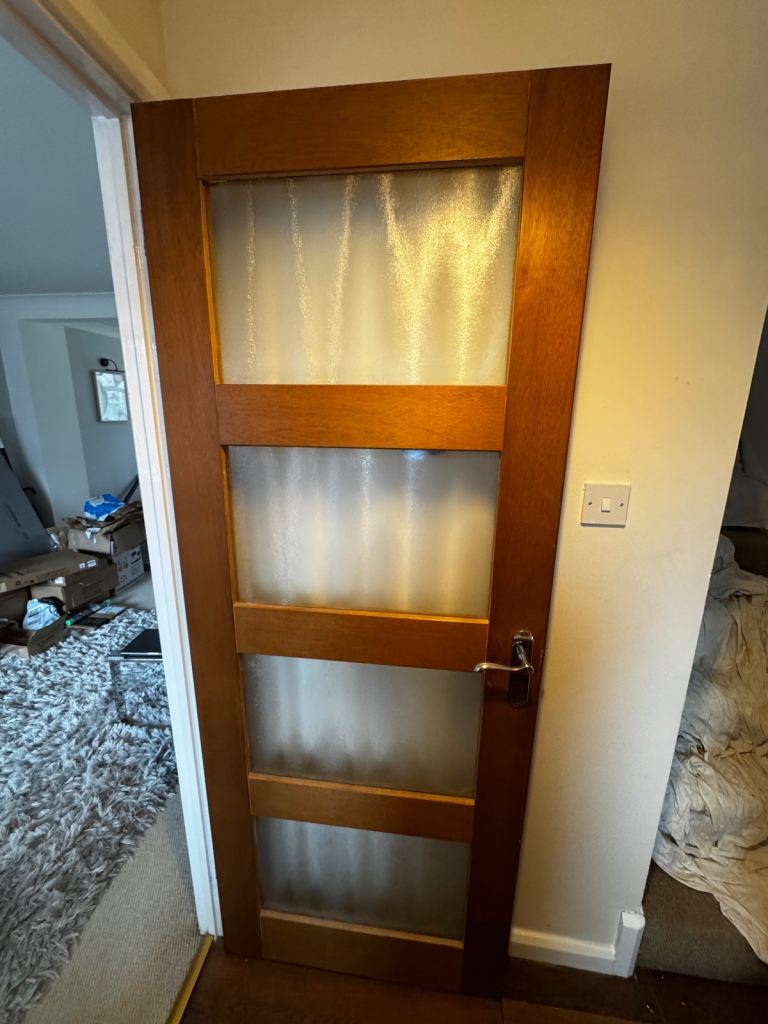 Solid wood door with glass panels x3