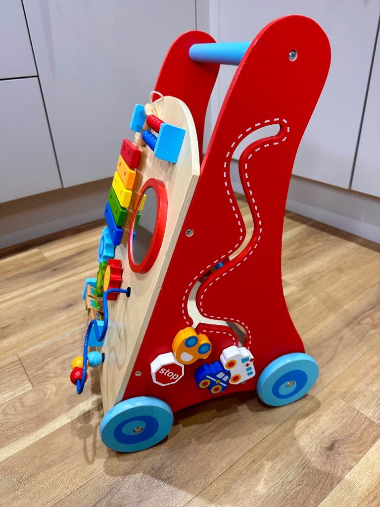 Wooden baby. Walker excellent condition FROM GRANDPARENTS HOUSE