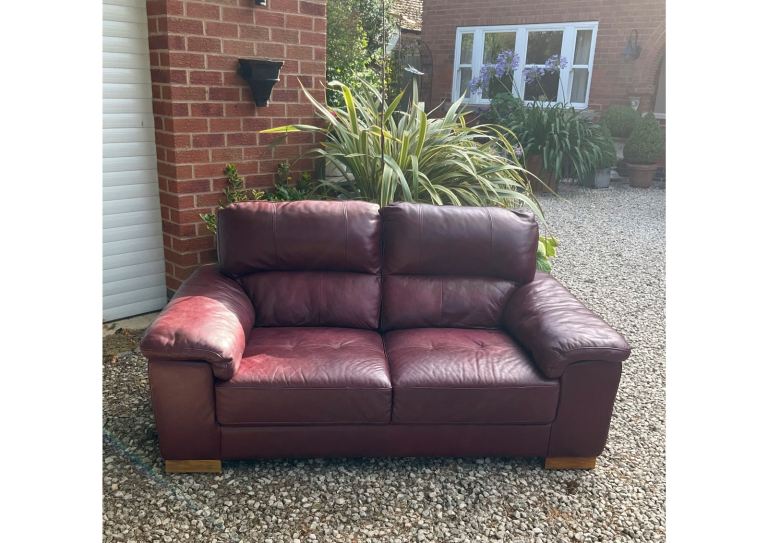 Red Leather Two-Seater Sofa – Good Condition