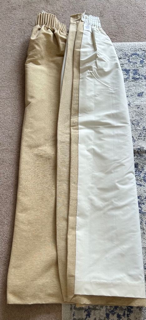 Free two pairs of gold colour lined curtains