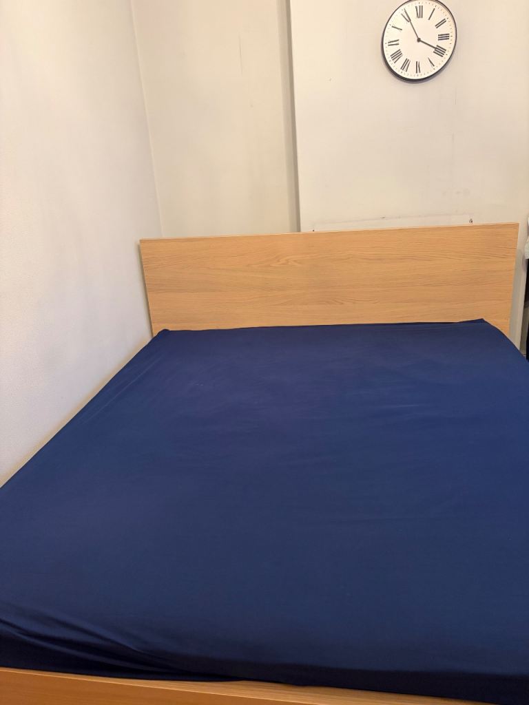 IKEA king size bed with slates-wodden