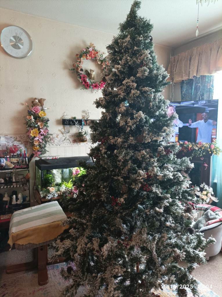 stands over 7 Feet Tall if using full size Beautiful White Snow Flocked Tree 