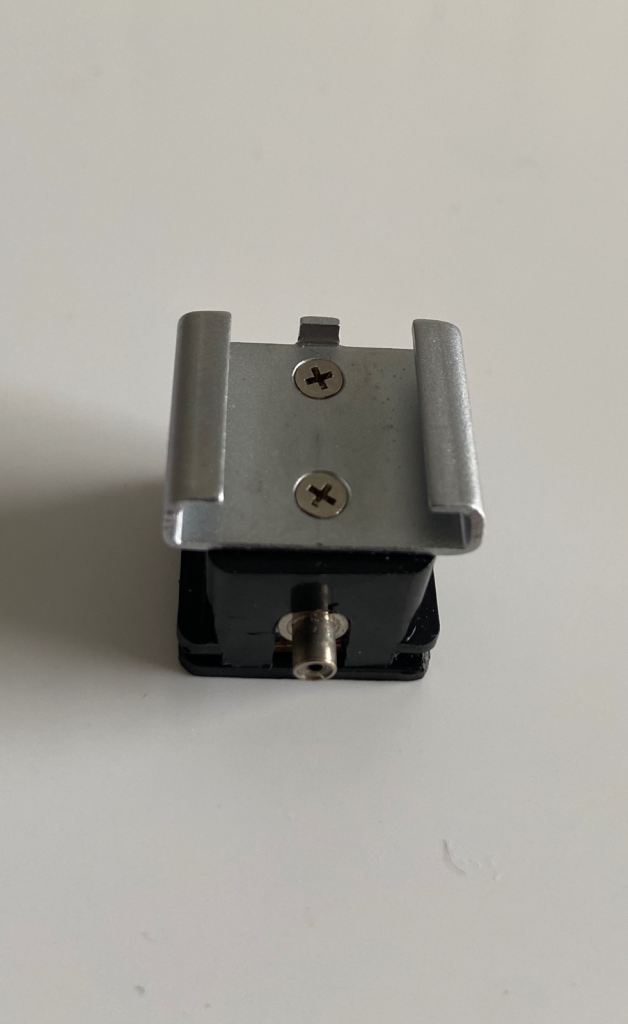 Camera flash hot shoe mount adapter for PC connection