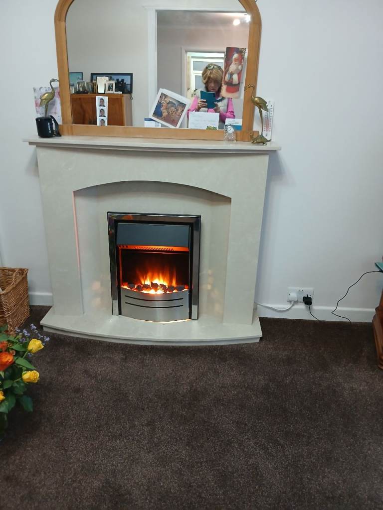 Fireplace with electric insert fire 
