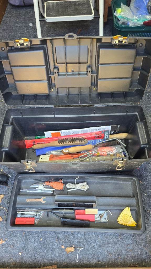 Large Black Plastic Toolbox with Various Hand Tools