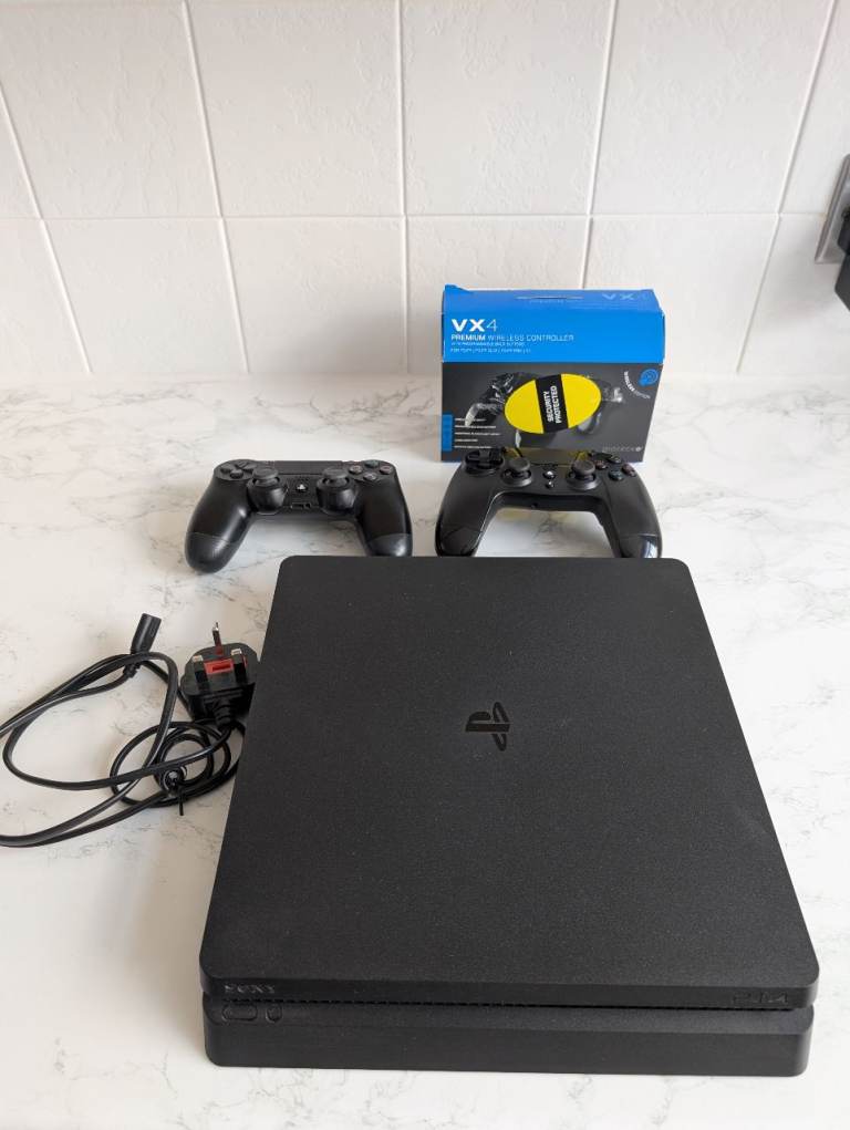 Sony PS4 Slim 500GB Bundle - Boxed with 2 Controllers & 9 Games
