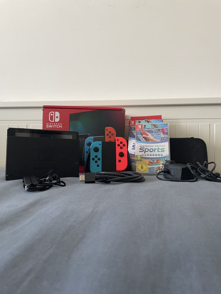 Nintendo Switch Console with Joy-Cons, Dock, and Games