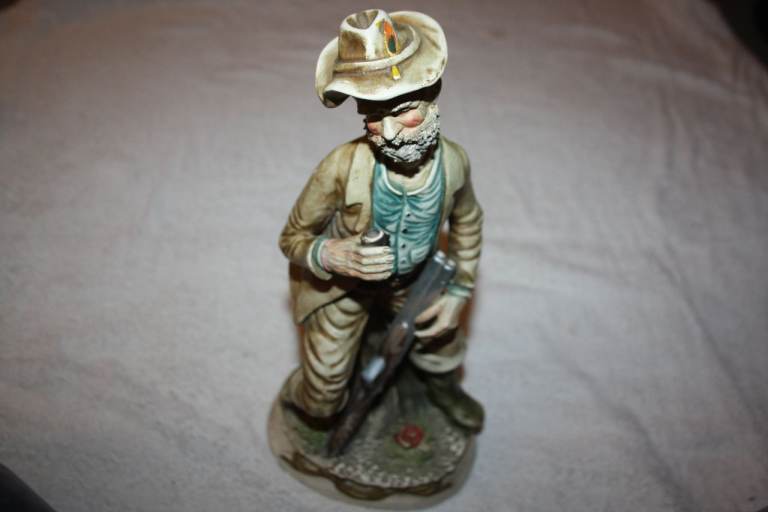 Vintage Ceramic Fisherman Figurine – Good Condition