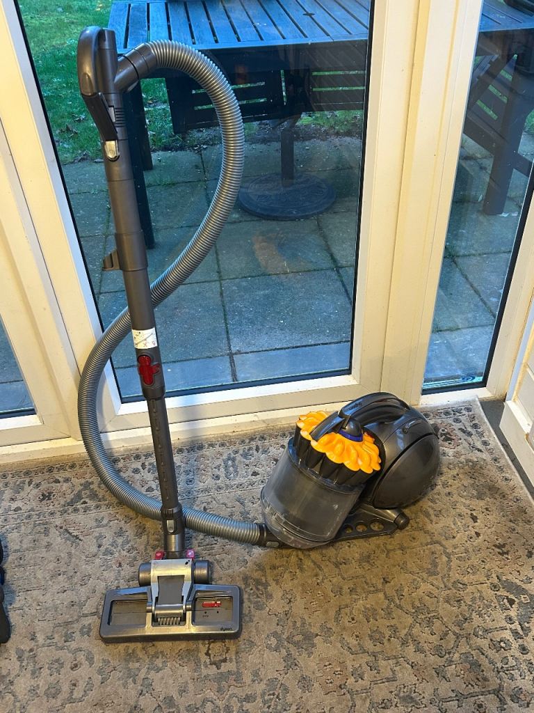 Two Dyson hoovers