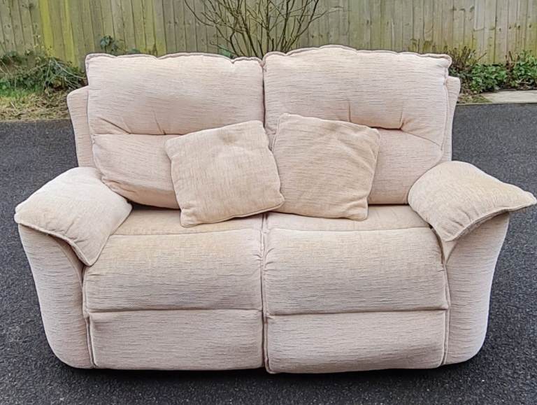 cream two-seater sofa