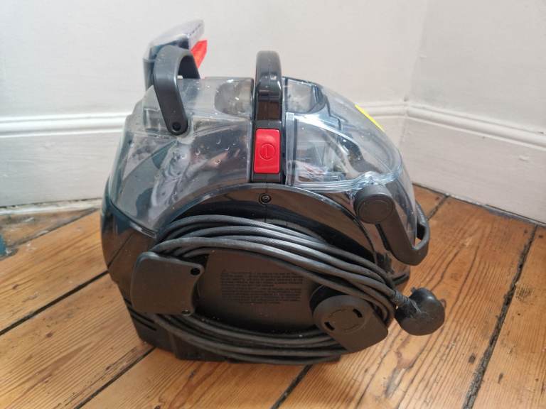 Bissell Spotclean Carpet Cleaner with products