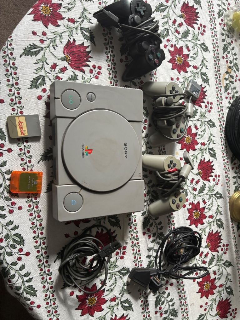 Classic Sony PS1 console with accessories