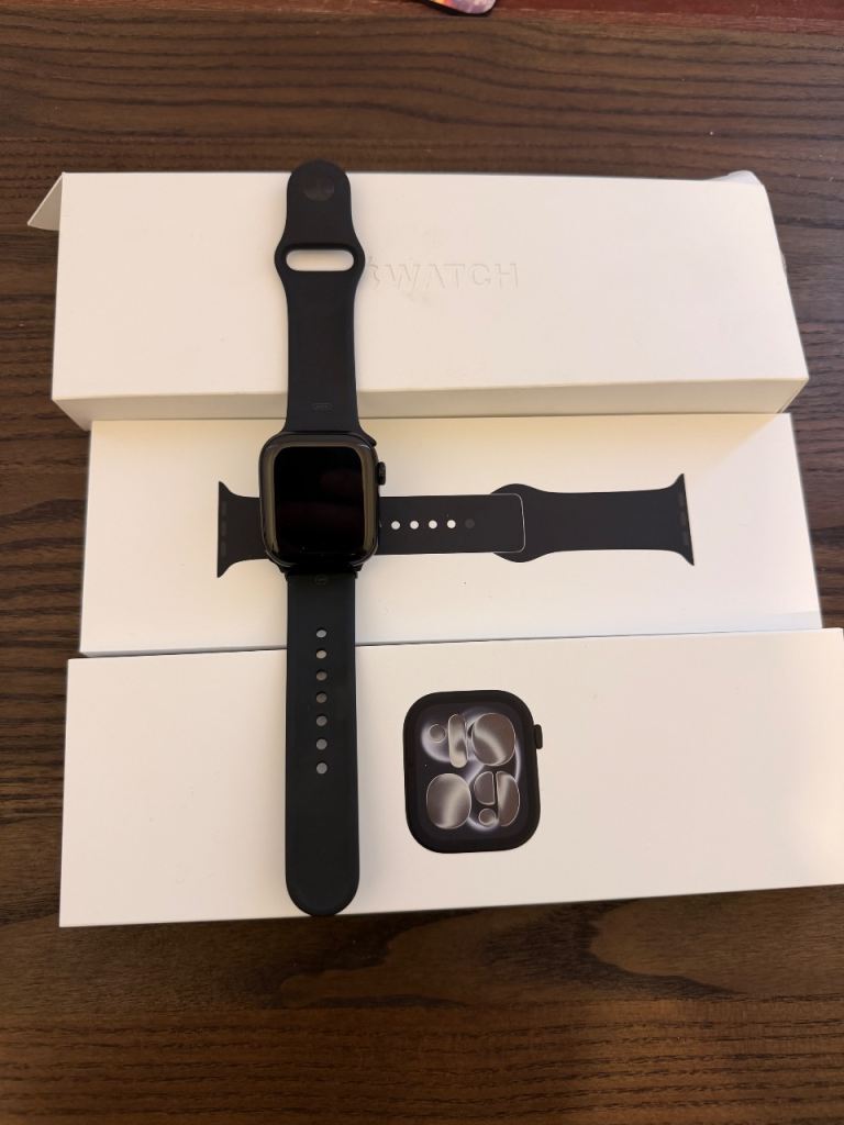 Apple Watch Series 11 with original band.