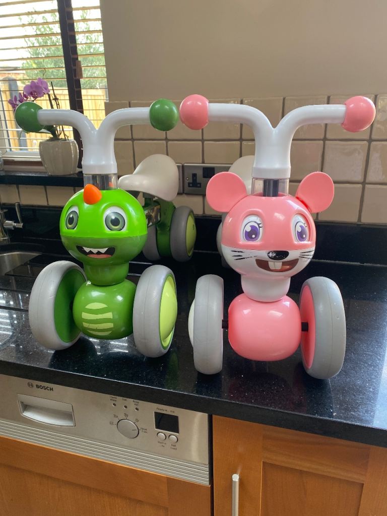 Pair of EVO Kids Balance Bikes - Green and Pink