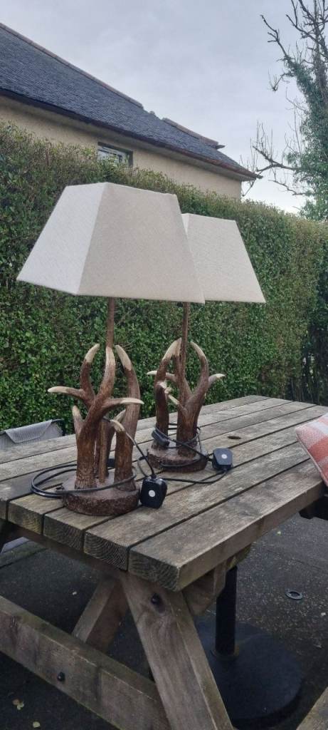 2 x antler lamps with cream shades 