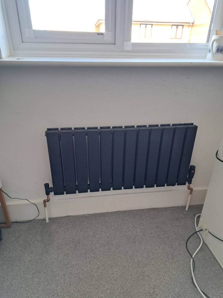 4 New Radiators unopened Black for £250